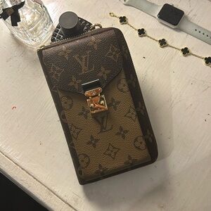 Louis Vuitton Monogram Reverse Vertical Zippy Métis Wallet